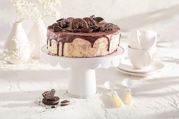 Homemade Cookie cheesecake served on white table.