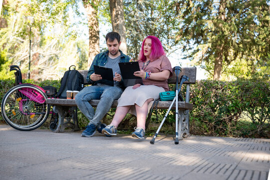 College couple studying together with accessibility focus