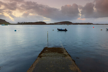 Fototapeta premium View from a jetty looking over the Sound of Kerrera with the Island of Kerrera in the distance. Oban, Argyll and Bute, Scotland, UK.