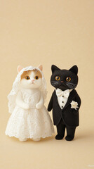 Obraz premium Elegant cats dressed as bride and groom in wedding attire