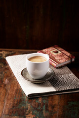 Cup of coffee on wooden background. Soft focus. Copy space.