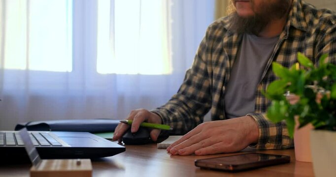 Man works seamlessly on laptop, exploring innovation with advanced apps, letting innovation reshape daily processes, while innovation drives faster problem-solving. Remote work of man at computer