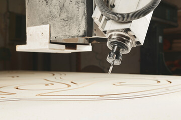 CNC router machine creates a layout of the shelf complex.