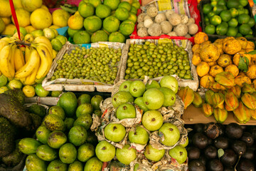 Fruits and vegetables at a local market in Sri lanka. Tropical or exotic fruits on the street in Asia.