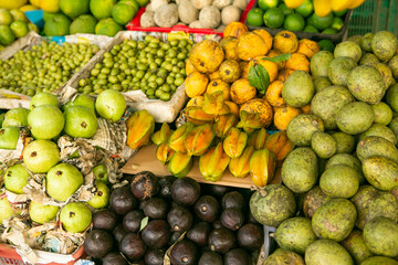Fruits and vegetables at a local market in Sri lanka. Tropical or exotic fruits on the street in Asia.