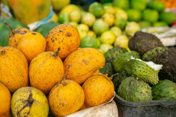 Fruits and vegetables at a local market in Sri lanka. Tropical or exotic fruits on the street in Asia.