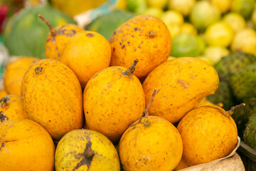 Fruits and vegetables at a local market in Sri lanka. Tropical or exotic fruits on the street in Asia.