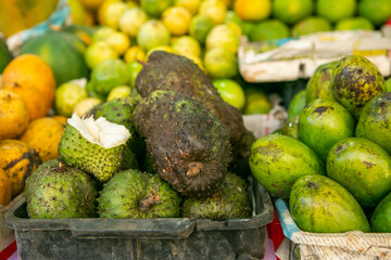 Fruits and vegetables at a local market in Sri lanka. Tropical or exotic fruits on the street in Asia.