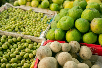 Fruits and vegetables at a local market in Sri lanka. Tropical or exotic fruits on the street in Asia.