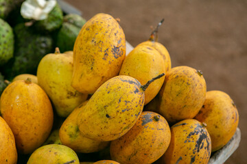 Fruits and vegetables at a local market in Sri lanka. Tropical or exotic fruits on the street in Asia.