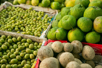 Fruits and vegetables at a local market in Sri lanka. Tropical or exotic fruits on the street in Asia.