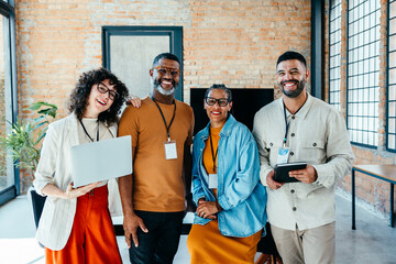 Friendly design team smiling in a creative business setting