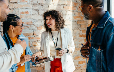 Coworkers having a casual meeting during a coffee break
