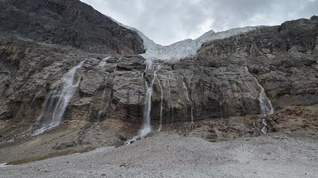A stunning glacier meltwater cascade at Mount Edith Cavell in the Canadian Rockies