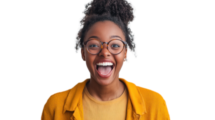 A joyful woman with curly hair and glasses, displaying happiness and excitement in a vibrant yellow jacket against a transparent background.