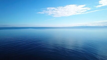 Obraz premium Baltic Sea aerial view showcasing vast expanse of water and distant coastline, symbolizing natural beauty and serene landscapes. 