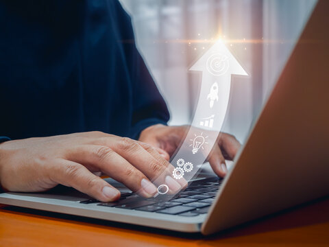 Business growth process background, investment profit, vision to success, startup planning, leadership concept. Arrows rising up with strategy icons while businessman work with laptop computer.