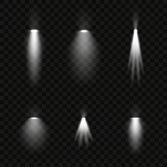 A set of white spotlight effects on a dark background. Collection of vector flares. White glare. Vector illustration EPS10