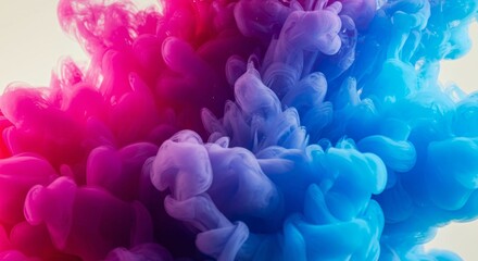 Fototapeta premium Vivid Ink Swirls in Water Creating a Stunning Abstract Design with Pink and Blue Hues