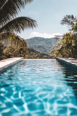 Obraz premium Serene Infinity Pool Tropical Paradise Mountain View Vacation Relaxation