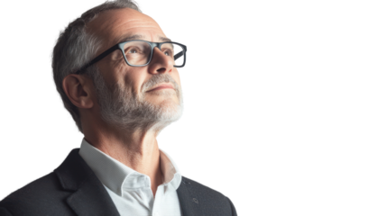 Thoughtful man with glasses gazing upwards, suggesting contemplation and hope, isolated on a white background.