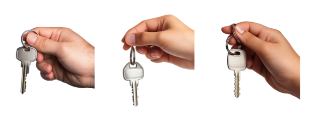 Hands holding metal keys, isolated on transparent background