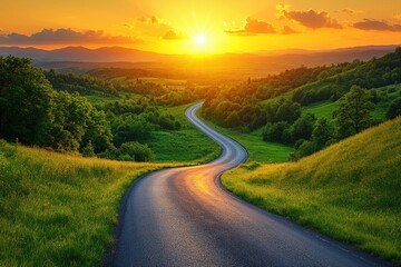 Fototapeta premium Serene Winding Road Through Lush Green Hills at Sunset