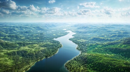 Obraz premium Majestic aerial view of winding river surrounded by lush green landscapes under bright sky