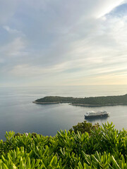 View of the endless sea with a passing liner