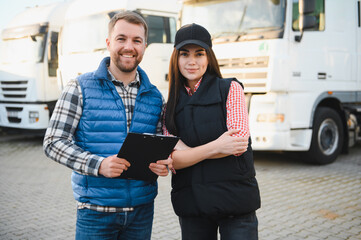 The truck driver receives documents for the cargo and the delivery route