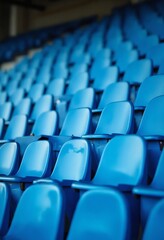 Naklejka premium Blue tribunes. seats of tribune on sport stadium. empty outdoor arena. concept of fans. chairs for audience. cultural environment concept. color and symmetry. empty seats. modern stadium