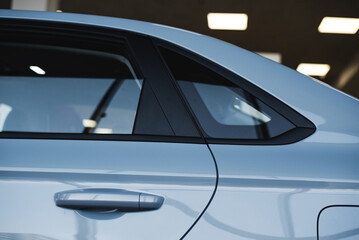 back door of a gray car close-up