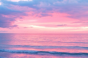 Serene Pink Sunset over Calm Ocean Waves Peaceful Coastal Scene