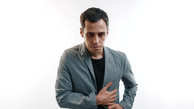 Worried man searching his pockets, looking for lost wallet or documents