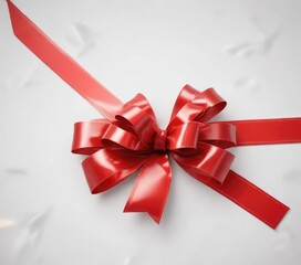 Close-up of a shiny red gift bow on a crisp white background, present, decor