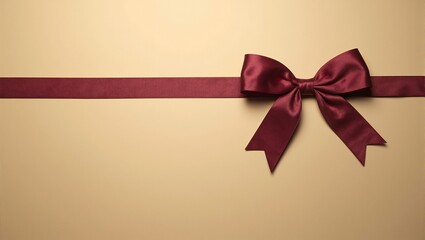 Luxurious burgundy satin bow on gold backdrop elegant and versatile for fall themed promotions