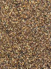 Natural small colorful pebbles background 02