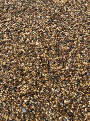 Natural small colorful pebbles background 01