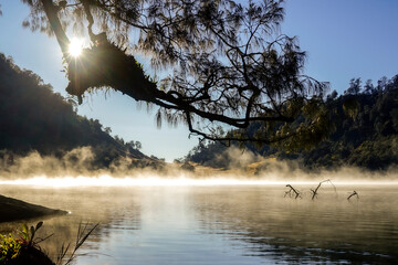 Misty morning scene on the Kumbolo lake in early morning