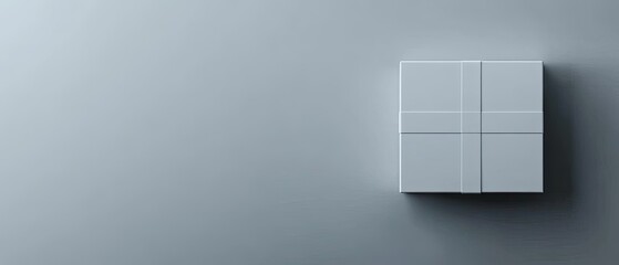 Fototapeta premium White gift box with a ribbon on a grey background.