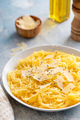 Spaghetti squash roasted and pulled apart served with olive oil and parmesan
