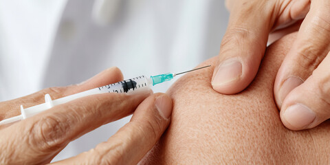 Syringe Injection into Upper Arm