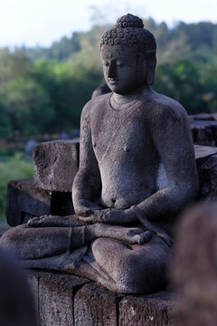 Stone Buddha statue, Borobudur, 9th-century Mahayana Buddhist temple, UNESCO, Java, Indonesia