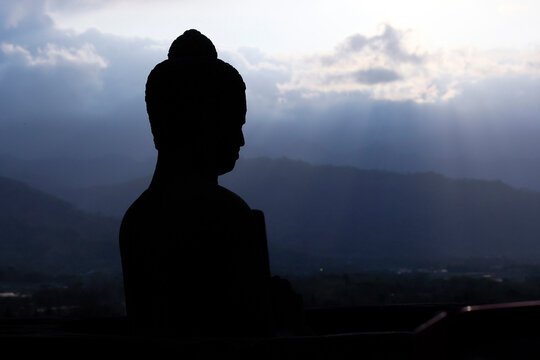Stone Buddha statue, Borobudur, 9th-century Mahayana Buddhist temple, UNESCO, Java, Indonesia
