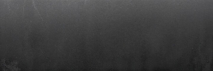 Obraz premium Textured black background with subtle variations for minimalist and design applications