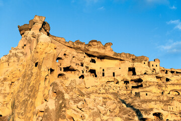Part of cliff dwelling complex of ancient Christian churches and houses in village of Cavusin near...