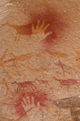 Vertical Image of Rock ledge on Rio Pinturas where famous rock paintings of handprints and animals are located. Location: Cueva de las Manos, UNESCO World Heritage Site, Patagonia, Argentina