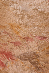 Vertical Image of Rock ledge on Rio Pinturas where famous rock paintings of handprints and animals are located. Location: Cueva de las Manos, UNESCO World Heritage Site, Patagonia, Argentina