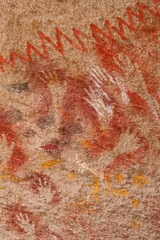 Vertical Image of Rock ledge on Rio Pinturas where famous rock paintings of handprints and animals are located. Location: Cueva de las Manos, UNESCO World Heritage Site, Patagonia, Argentina