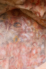 Vertical Image of Rock ledge on Rio Pinturas where famous rock paintings of handprints and animals are located. Location: Cueva de las Manos, UNESCO World Heritage Site, Patagonia, Argentina